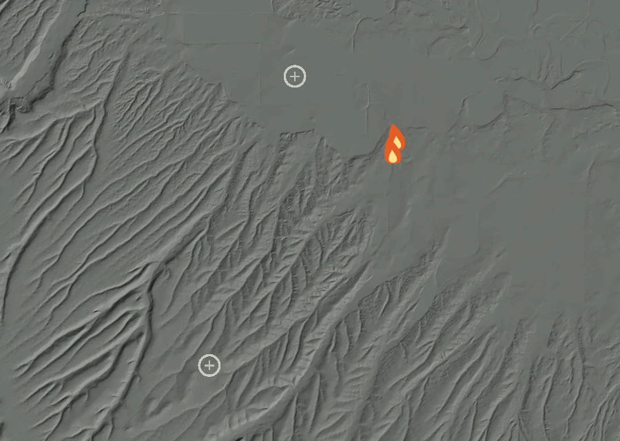 Shaded relief map of the 2040 Newland Rd Fire. Amber flames mark every place that gave off heat in the last day; the shading is the shape of the ground.