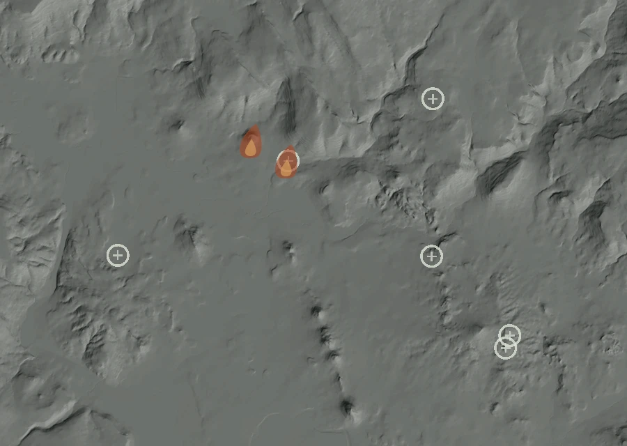 Shaded relief map of the 383 Fire. Amber flames mark every place that gave off heat in the last day; the shading is the shape of the ground.