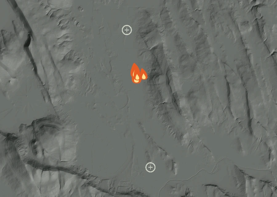 Shaded relief map of the 401 Fire. Amber flames mark every place that gave off heat in the last day; the shading is the shape of the ground.