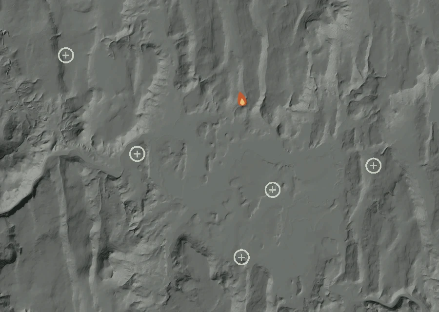 Shaded relief map of the 407 Fire. Amber flames mark every place that gave off heat in the last day; the shading is the shape of the ground.