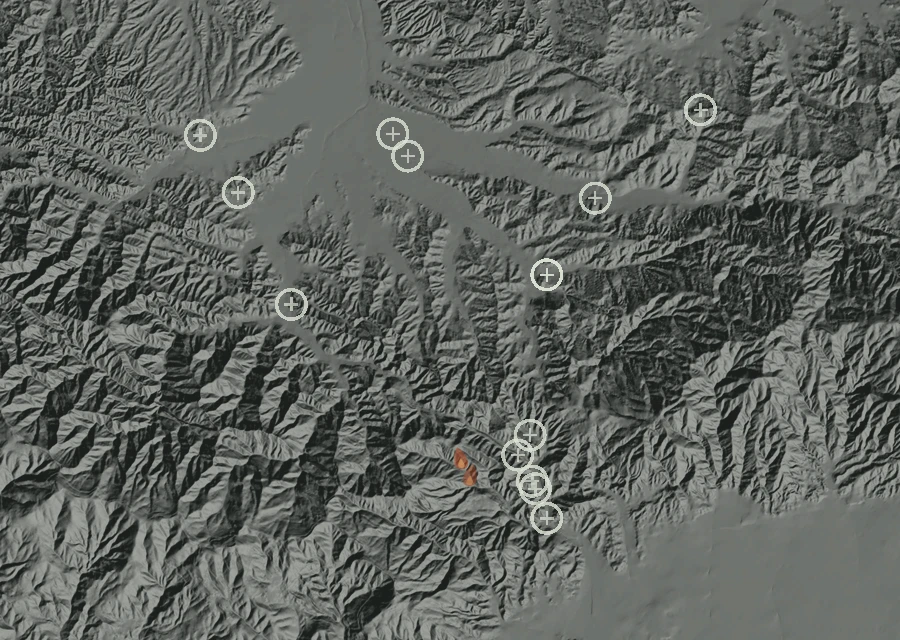 Shaded relief map of the Alamo Fire. Amber flames mark every place that gave off heat in the last day; the shading is the shape of the ground.