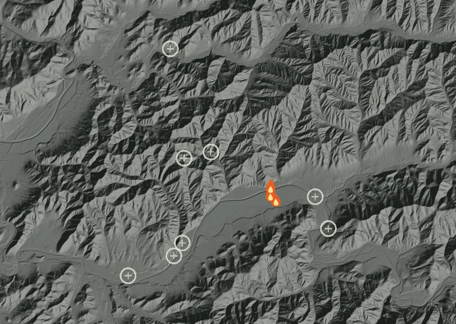 Shaded relief map of the Beckworth Fire. Amber flames mark every place that gave off heat in the last day; the shading is the shape of the ground.