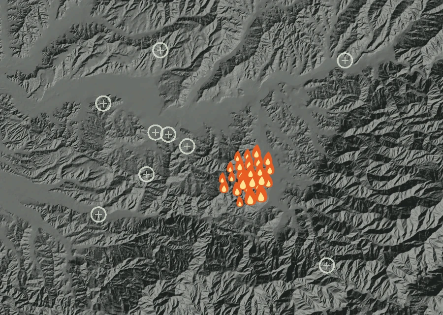 Shaded relief map of the Bike Fire. Amber flames mark every place that gave off heat in the last day; the shading is the shape of the ground.