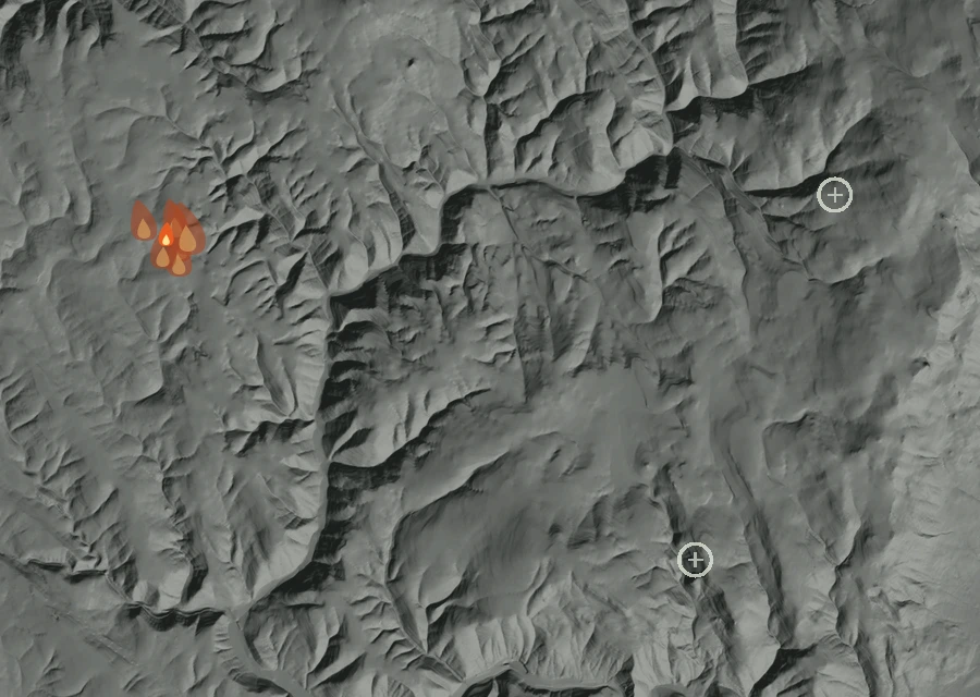 Shaded relief map of the Camp 1 Fire. Amber flames mark every place that gave off heat in the last day; the shading is the shape of the ground.