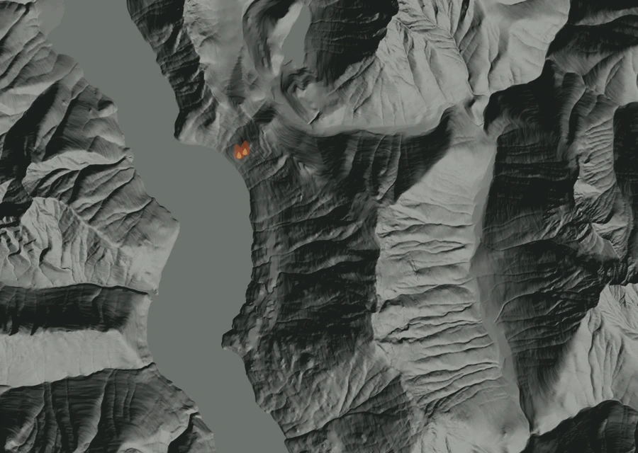 Shaded relief map of the Desolation Fire. Amber flames mark every place that gave off heat in the last day; the shading is the shape of the ground.