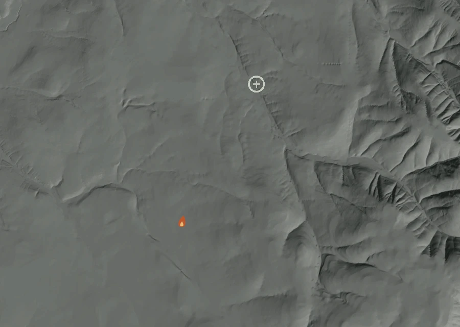 Shaded relief map of the Eagle Creek Fire. Amber flames mark every place that gave off heat in the last day; the shading is the shape of the ground.