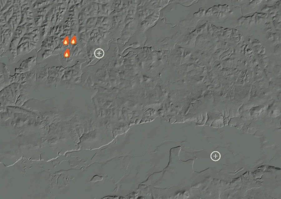 Shaded relief map of the Fields Fire. Amber flames mark every place that gave off heat in the last day; the shading is the shape of the ground.