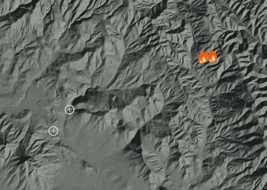 Shaded relief map of the Grade Fire. Amber flames mark every place that gave off heat in the last day; the shading is the shape of the ground.