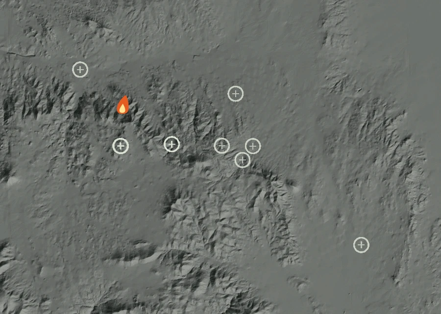 Shaded relief map of the Gustin Fire. Amber flames mark every place that gave off heat in the last day; the shading is the shape of the ground.