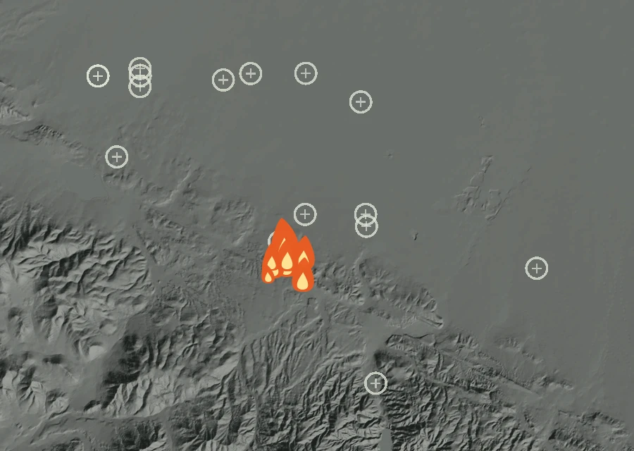 Shaded relief map of the Hilary Fire. Amber flames mark every place that gave off heat in the last day; the shading is the shape of the ground.