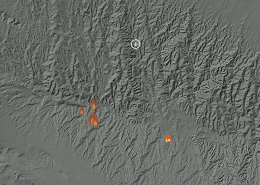 Shaded relief map of the Hillcrest Fire. Amber flames mark every place that gave off heat in the last day; the shading is the shape of the ground.