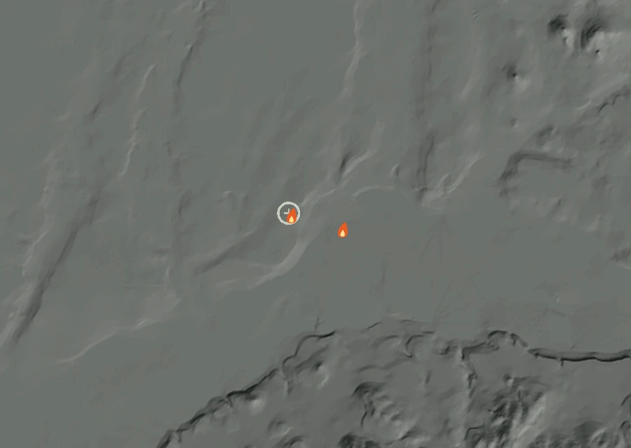 Shaded relief map of the Holmes Fire. Amber flames mark every place that gave off heat in the last day; the shading is the shape of the ground.