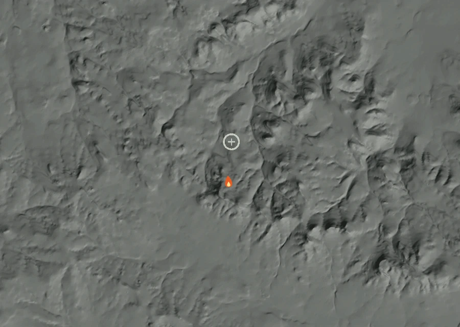 Shaded relief map of the Horse Creek Draw Fire. Amber flames mark every place that gave off heat in the last day; the shading is the shape of the ground.
