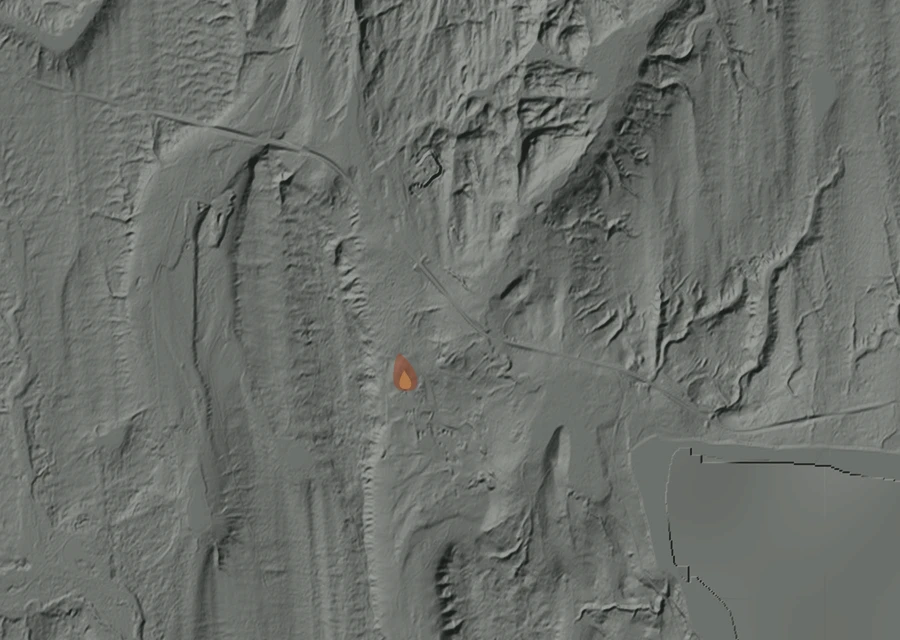 Shaded relief map of the Horseshoe Fire. Amber flames mark every place that gave off heat in the last day; the shading is the shape of the ground.