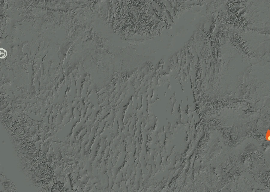 Shaded relief map of the Kimball Fire. Amber flames mark every place that gave off heat in the last day; the shading is the shape of the ground.