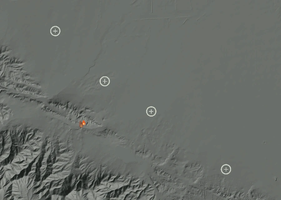 Shaded relief map of the Lac-296494 Fire. Amber flames mark every place that gave off heat in the last day; the shading is the shape of the ground.