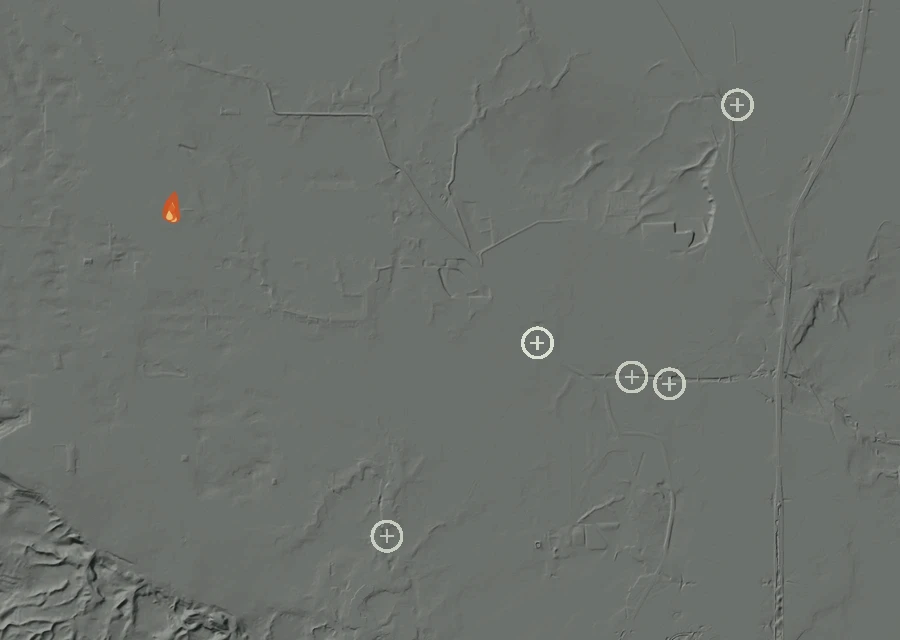 Shaded relief map of the Lac-297151 Fire. Amber flames mark every place that gave off heat in the last day; the shading is the shape of the ground.