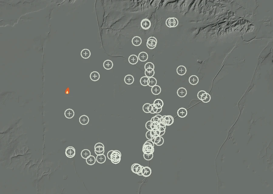 Shaded relief map of the Lac-297330 Fire. Amber flames mark every place that gave off heat in the last day; the shading is the shape of the ground.