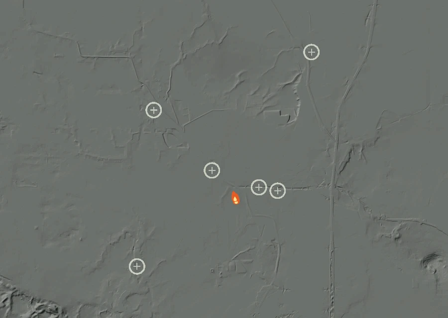 Shaded relief map of the Lac-299553 Fire. Amber flames mark every place that gave off heat in the last day; the shading is the shape of the ground.