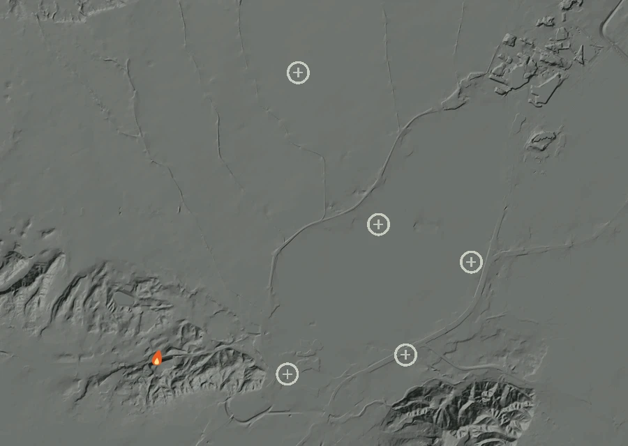 Shaded relief map of the Lac-301056 Fire. Amber flames mark every place that gave off heat in the last day; the shading is the shape of the ground.