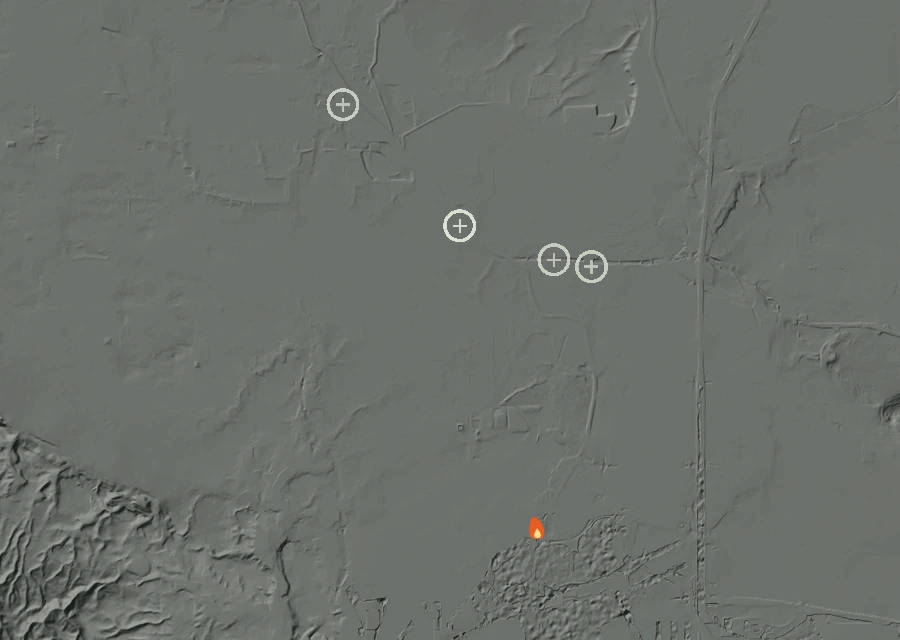 Shaded relief map of the Lac-302672 Fire. Amber flames mark every place that gave off heat in the last day; the shading is the shape of the ground.