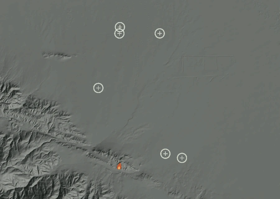 Shaded relief map of the Lac-303858 Fire. Amber flames mark every place that gave off heat in the last day; the shading is the shape of the ground.