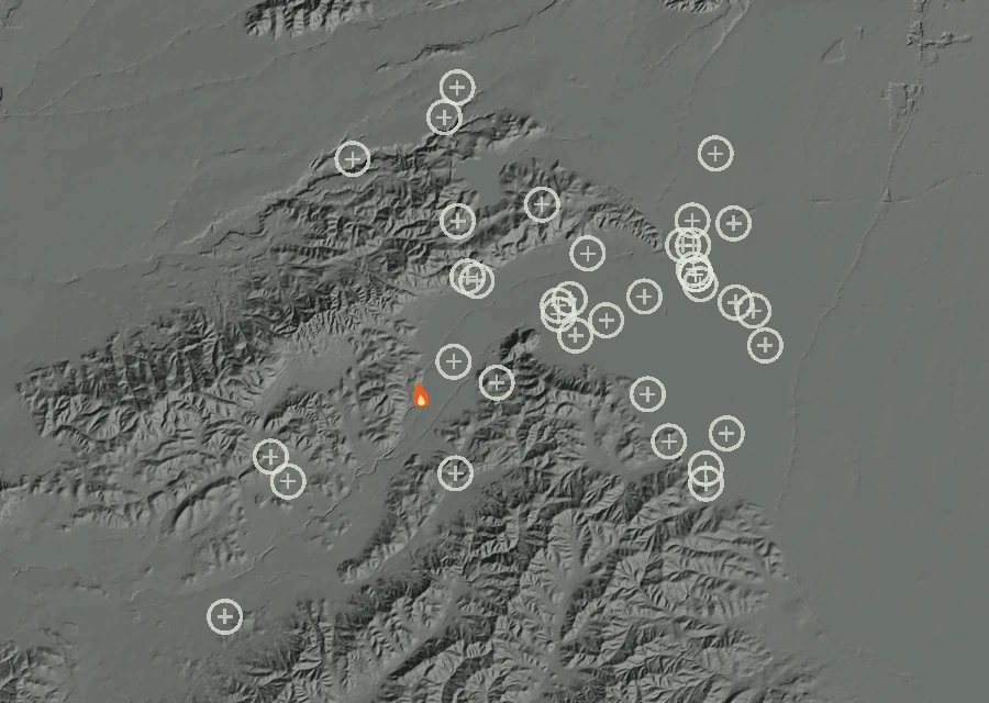 Shaded relief map of the Lac-306404 Fire. Amber flames mark every place that gave off heat in the last day; the shading is the shape of the ground.