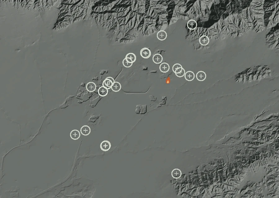 Shaded relief map of the Lac-306430 Fire. Amber flames mark every place that gave off heat in the last day; the shading is the shape of the ground.