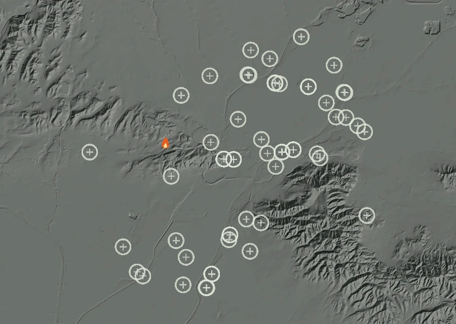 Shaded relief map of the Lac-311309 Fire. Amber flames mark every place that gave off heat in the last day; the shading is the shape of the ground.