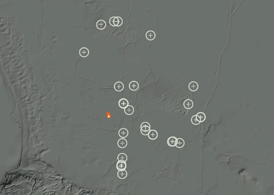 Shaded relief map of the Lac-313459 Fire. Amber flames mark every place that gave off heat in the last day; the shading is the shape of the ground.