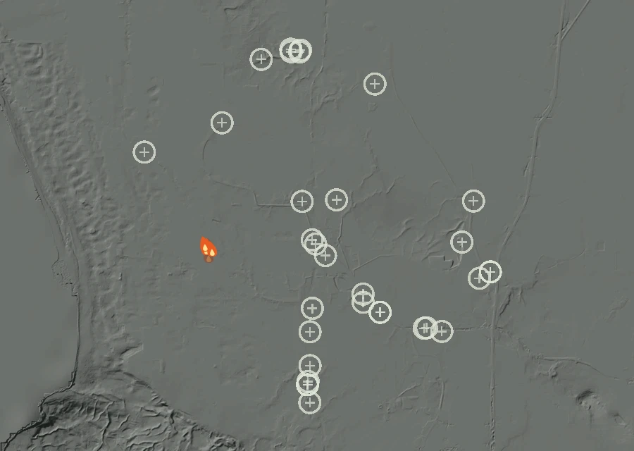 Shaded relief map of the Lac-313781 Fire. Amber flames mark every place that gave off heat in the last day; the shading is the shape of the ground.