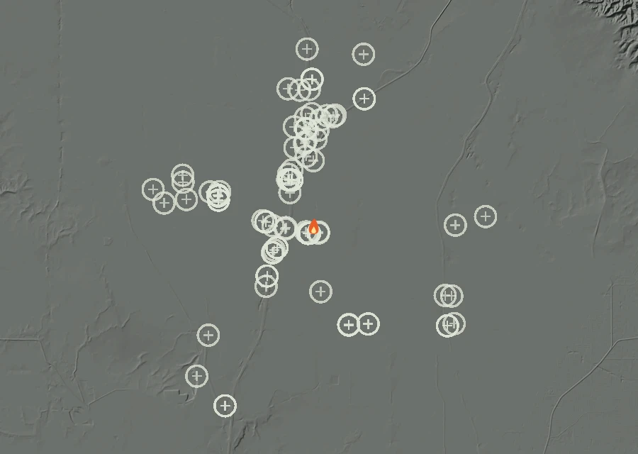 Shaded relief map of the Lac-313831 Fire. Amber flames mark every place that gave off heat in the last day; the shading is the shape of the ground.