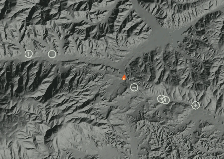 Shaded relief map of the Lac-341462 Fire. Amber flames mark every place that gave off heat in the last day; the shading is the shape of the ground.