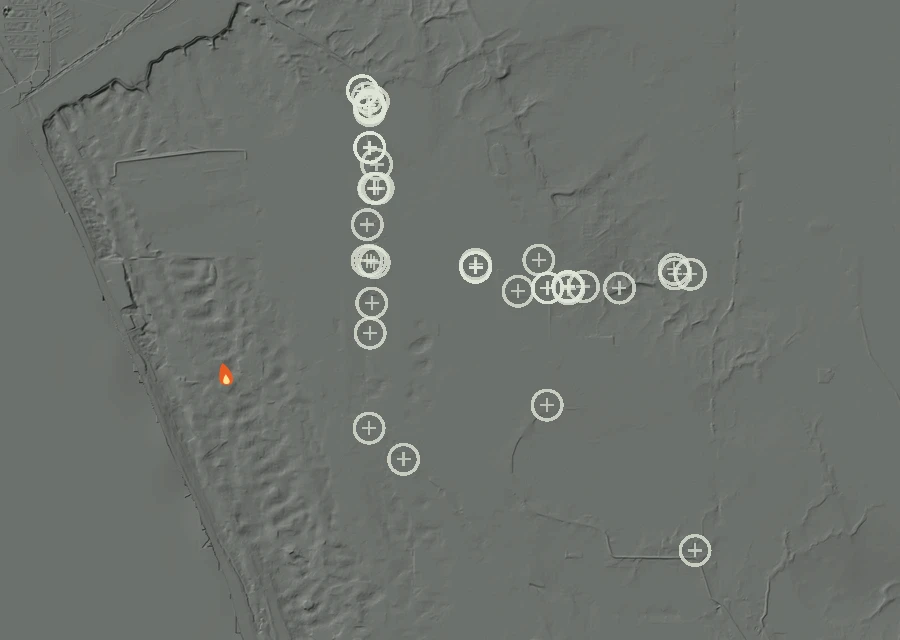 Shaded relief map of the Lac-344661 Fire. Amber flames mark every place that gave off heat in the last day; the shading is the shape of the ground.