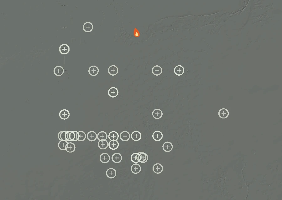 Shaded relief map of the Lac-352011 Fire. Amber flames mark every place that gave off heat in the last day; the shading is the shape of the ground.