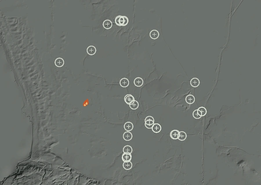 Shaded relief map of the Lac-353875 Fire. Amber flames mark every place that gave off heat in the last day; the shading is the shape of the ground.
