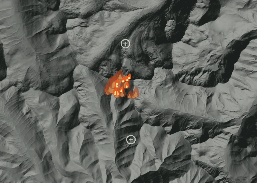 Shaded relief map of the May Flower Fire. Amber flames mark every place that gave off heat in the last day; the shading is the shape of the ground.