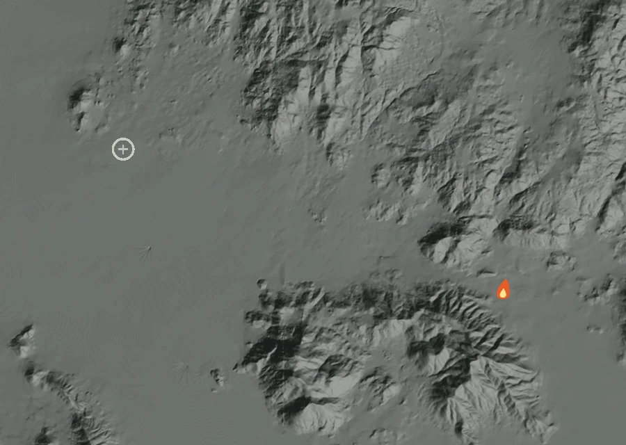 Shaded relief map of the Melba Fire. Amber flames mark every place that gave off heat in the last day; the shading is the shape of the ground.