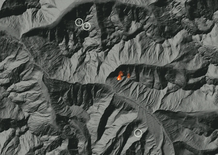Shaded relief map of the Miners Fire. Amber flames mark every place that gave off heat in the last day; the shading is the shape of the ground.