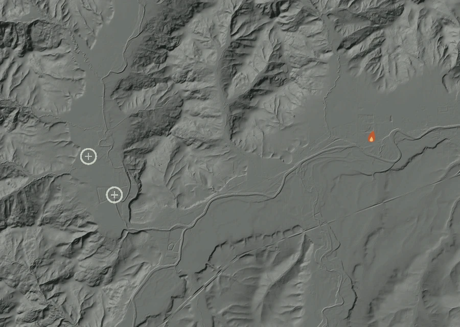 Shaded relief map of the NonSTAT Rock Creek Rd Fire. Amber flames mark every place that gave off heat in the last day; the shading is the shape of the ground.