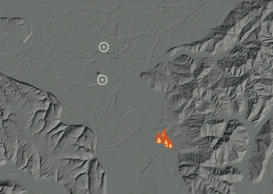 Shaded relief map of the Northbound Fire. Amber flames mark every place that gave off heat in the last day; the shading is the shape of the ground.