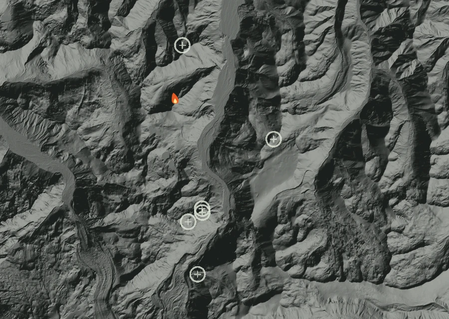 Shaded relief map of the Pigeon Fire. Amber flames mark every place that gave off heat in the last day; the shading is the shape of the ground.