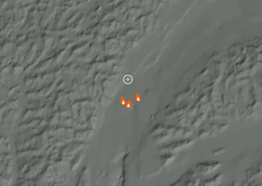 Shaded relief map of the Pine Creek Road Fire. Amber flames mark every place that gave off heat in the last day; the shading is the shape of the ground.