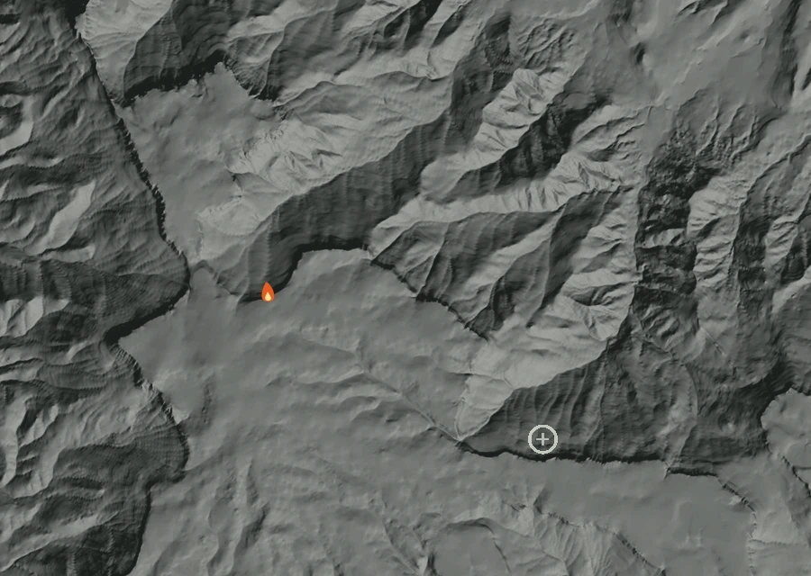 Shaded relief map of the Post Fire. Amber flames mark every place that gave off heat in the last day; the shading is the shape of the ground.
