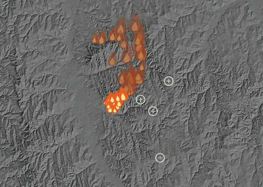 Shaded relief map of the Rancher Fire. Amber flames mark every place that gave off heat in the last day; the shading is the shape of the ground.