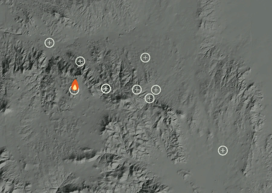 Shaded relief map of the Rru/Harford Fire. Amber flames mark every place that gave off heat in the last day; the shading is the shape of the ground.
