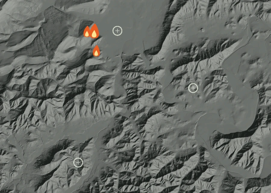 Shaded relief map of the Strickland Canyon Fire. Amber flames mark every place that gave off heat in the last day; the shading is the shape of the ground.