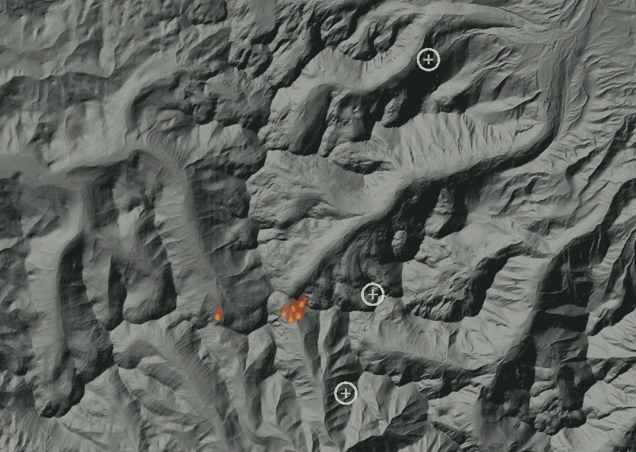 Shaded relief map of the Summit Lake Fire. Amber flames mark every place that gave off heat in the last day; the shading is the shape of the ground.