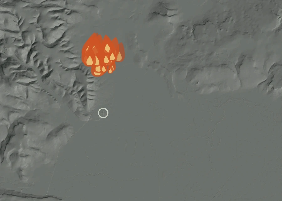 Shaded relief map of the Sycan Fire. Amber flames mark every place that gave off heat in the last day; the shading is the shape of the ground.