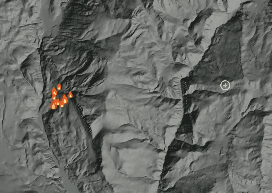 Shaded relief map of the Telephone Fire. Amber flames mark every place that gave off heat in the last day; the shading is the shape of the ground.